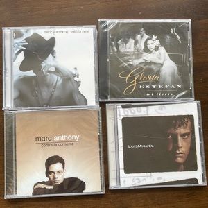 Marc Anthony and Gloria Estefan CDs compact discs. Luis Miguel not available.